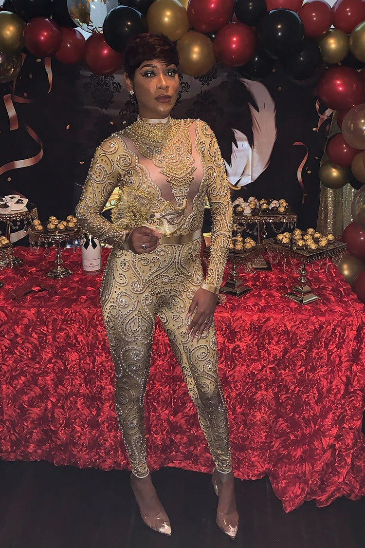 A fashionable gold rhinestone bodysuit with sparkling details, tailored for a flattering, stylish fit