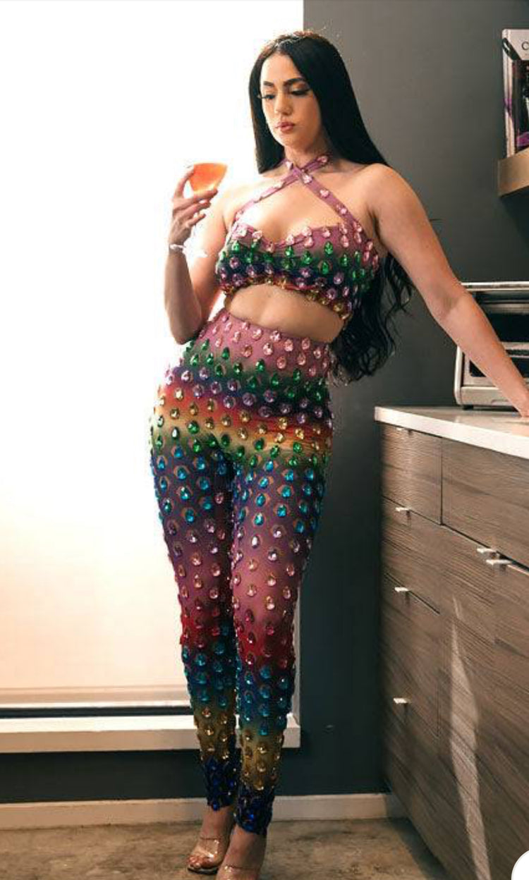 A vibrant rainbow set party dress with colorful patterns, perfect for festive occasions and celebrations.