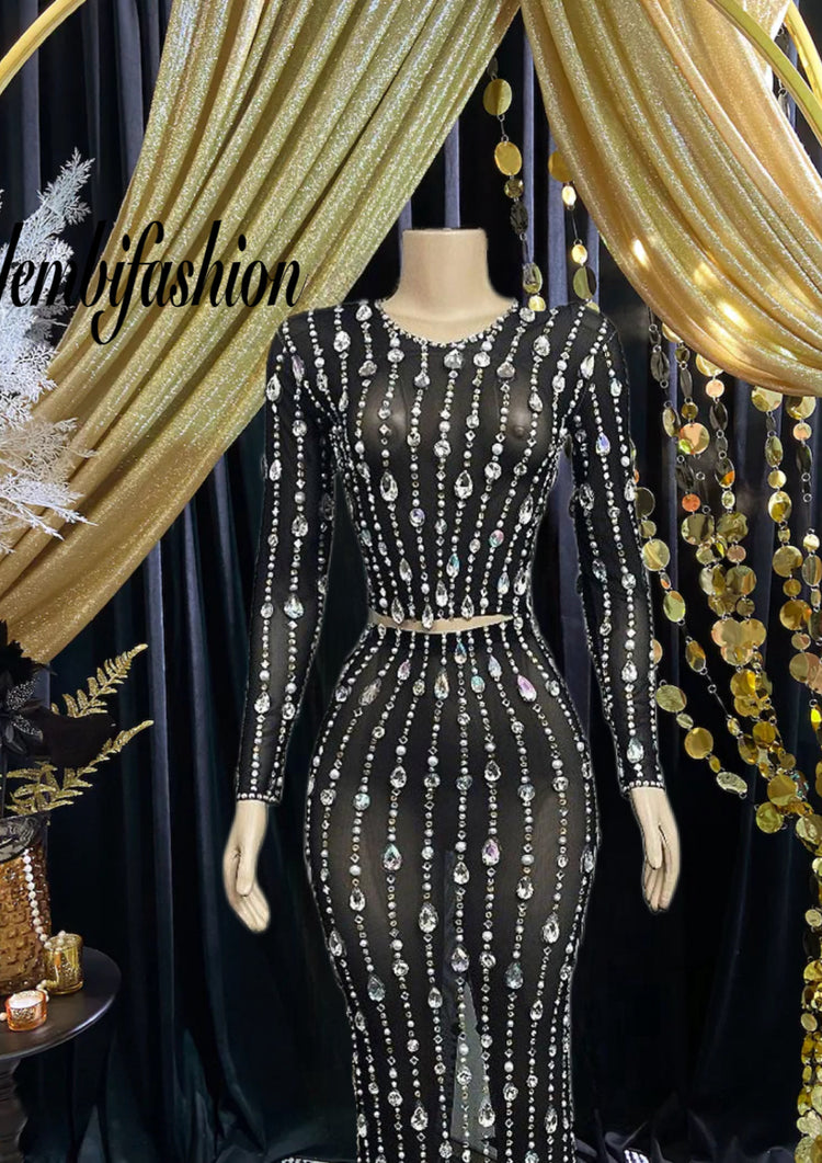 A stylish black mesh dress set featuring long sleeves and a modern, breathable design.