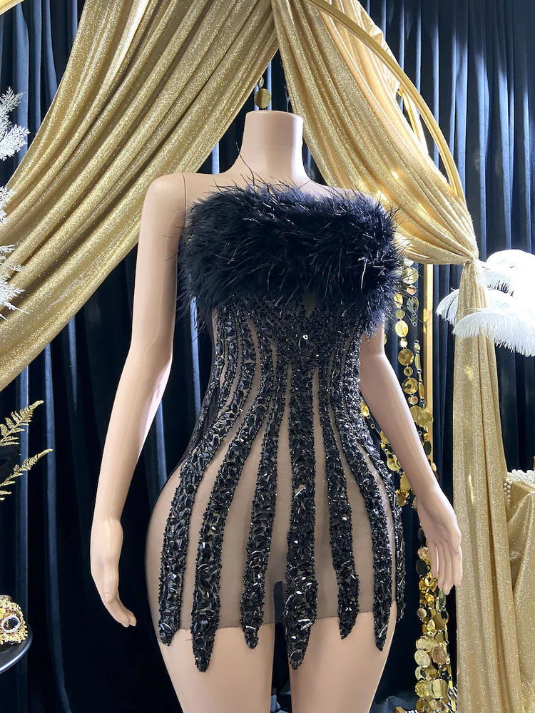 Ella Black Mini Dress featuring a tulle design and rhinestone details for a chic and glamorous look.