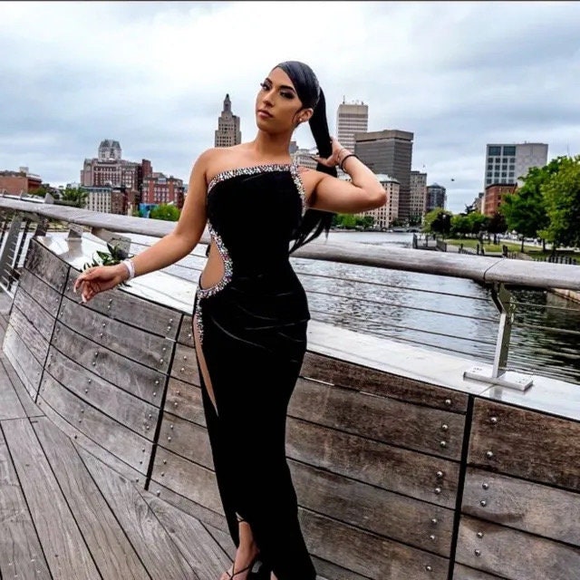 A luxurious evening gown with pearls, perfect as a long dress or prom dress for formal occasions.