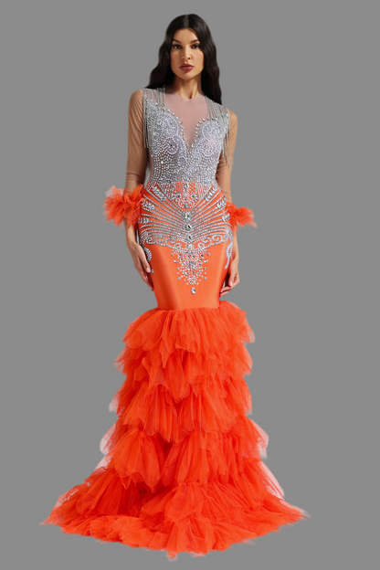 Zendaya wearing a beautiful embroidered tulle dress, showcasing the elegance of tulle evening gowns.