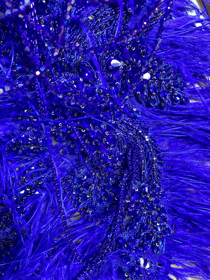 Blue diamante tulle mini dress with sparkling rhinestone details, perfect for parties and special occasions."