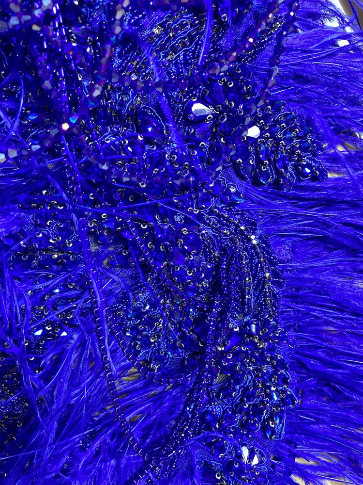 Blue diamante tulle mini dress with sparkling rhinestone details, perfect for parties and special occasions."