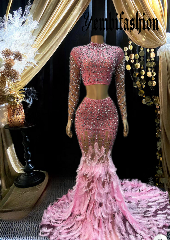 A stunning pink feather set cocktail dress with elegant feather detailing, perfect for formal events and parties.