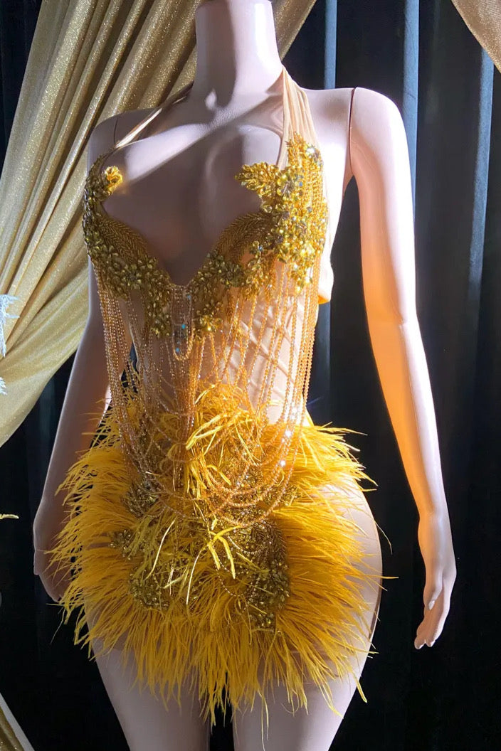 A gold crystal rhinestone birthday party dress with intricate crystal detailing, perfect for glamorous events like birthdays or cocktail parties.