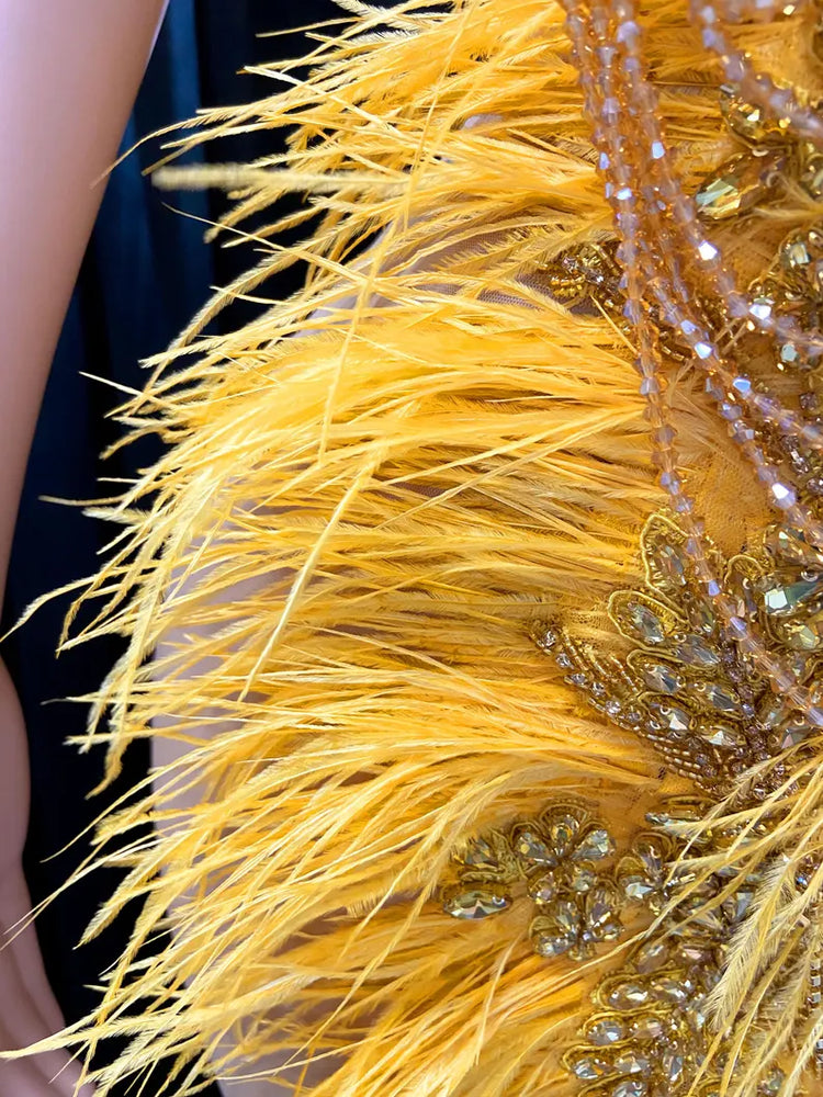 A gold crystal rhinestone birthday party dress with intricate crystal detailing, perfect for glamorous events like birthdays or cocktail parties.