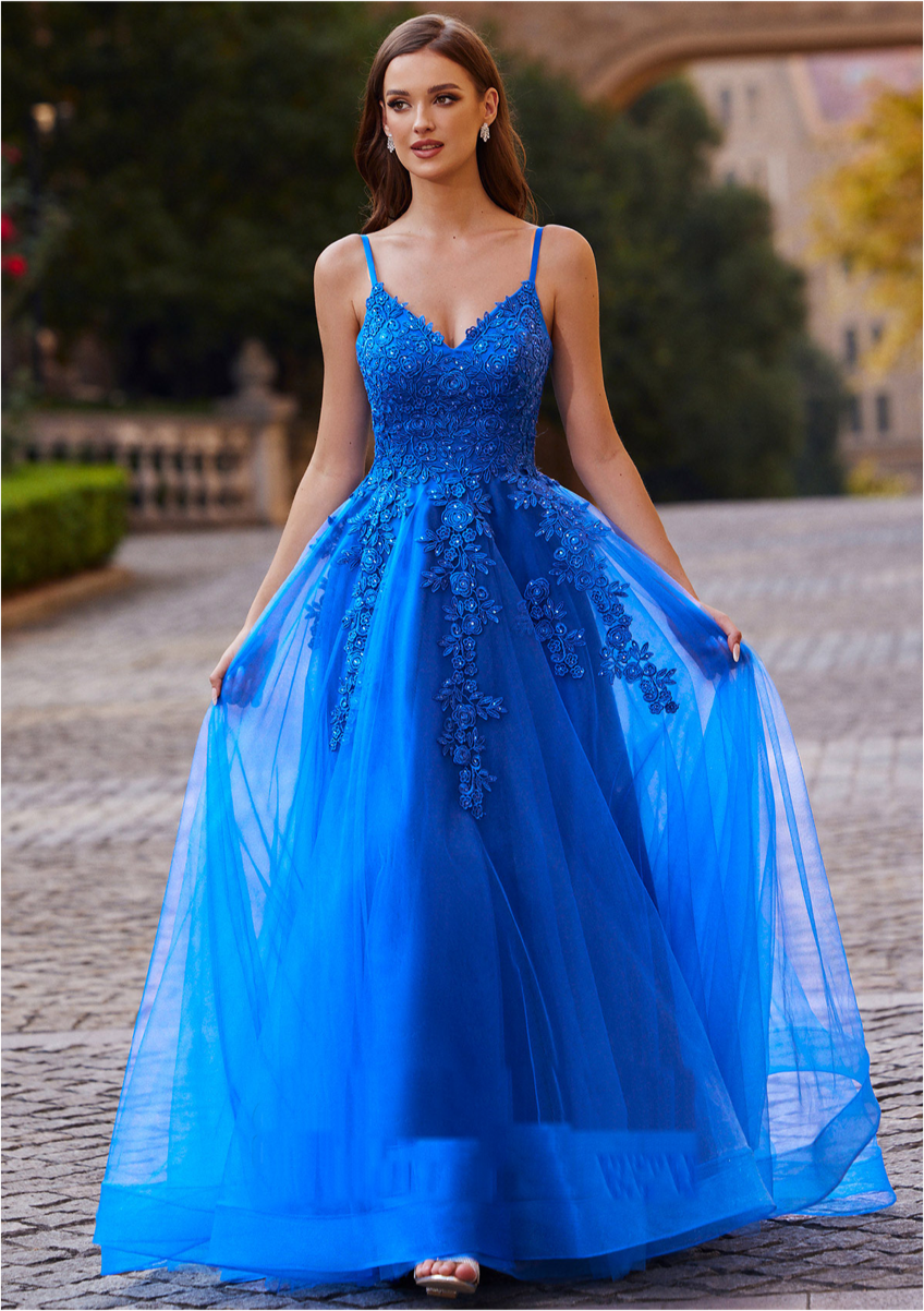 A-line tulle prom dress with intricate applique details, featuring a flowing tulle skirt and a fitted bodice, perfect for formal occasions and special events