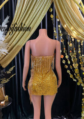 A shimmering mini dress covered in sequins, ideal for parties and special occasions, available online.