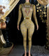 A fashionable gold rhinestone bodysuit with sparkling details, tailored for a flattering, stylish fit