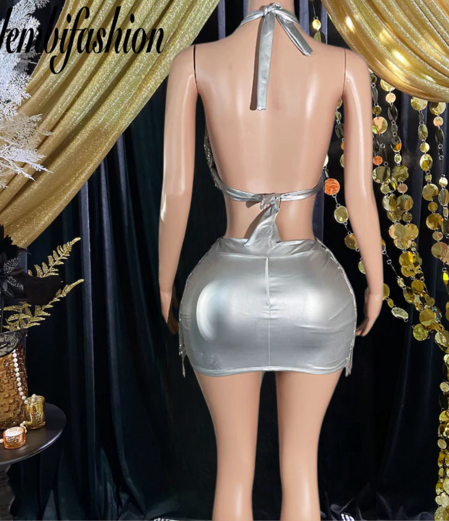 A fashionable two-piece matching set with rhinestone detailing, ideal for parties and special occasions.
