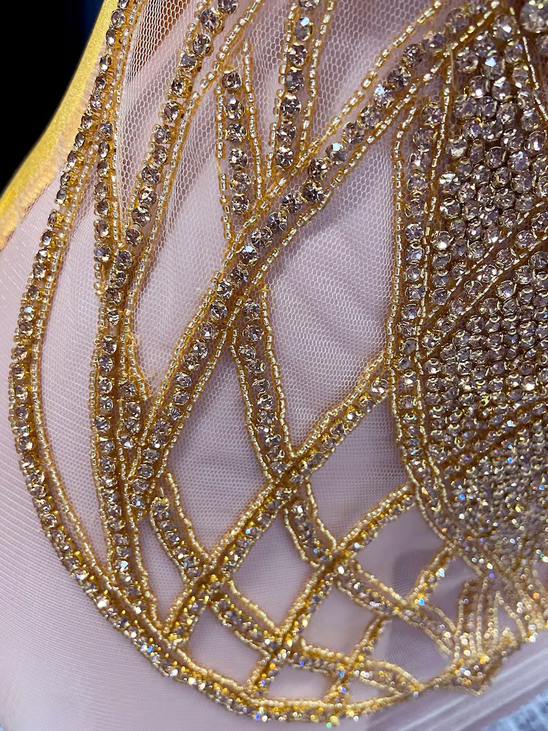 Eve Embellished Mini Dress in Gold with intricate rhinestone detailing, perfect for glamorous events and special occasions."