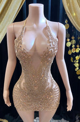 Front view of a gold rhinestone A-line mini dress with sparkling rhinestones and an elegant fit.