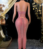 Elegant long sleeveless cocktail dress with sparkling diamante details and a flattering silhouette.