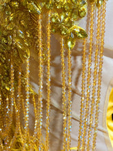 A gold crystal rhinestone birthday party dress with intricate crystal detailing, perfect for glamorous events like birthdays or cocktail parties.