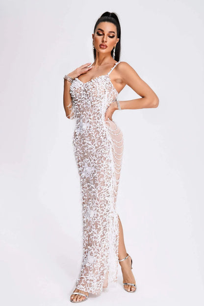 White pearl dress with intricate pearl detailing, featuring a flattering and elegant silhouette.