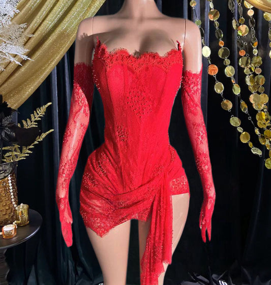 A chic red mini lace dress with intricate detailing, perfect as a versatile set dress for any occasion.