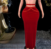 A stylish red skirt set featuring rhinestone detailing, perfect for glamorous occasions.