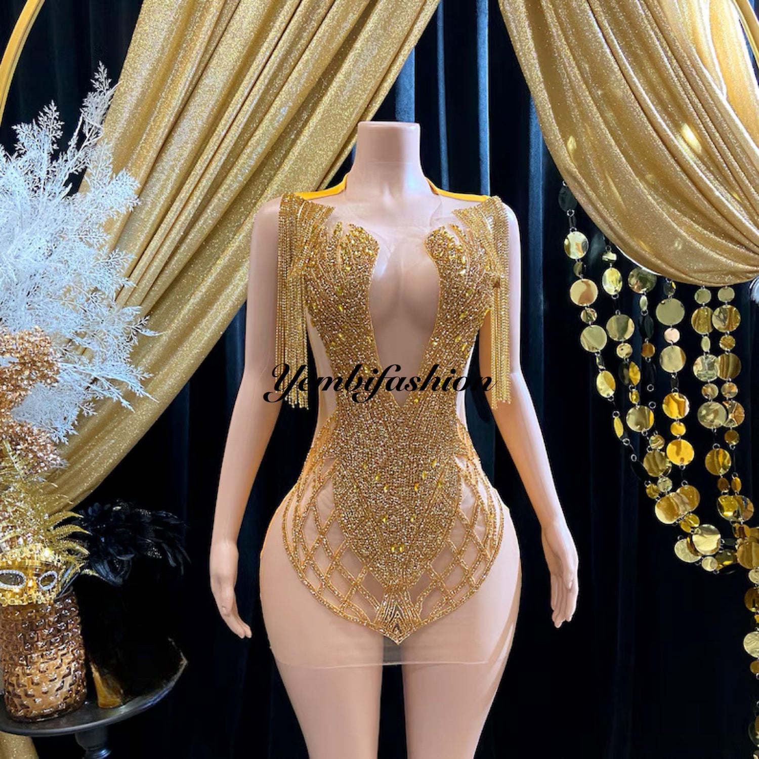 Eve Embellished Mini Dress in Gold with intricate rhinestone detailing, perfect for glamorous events and special occasions."