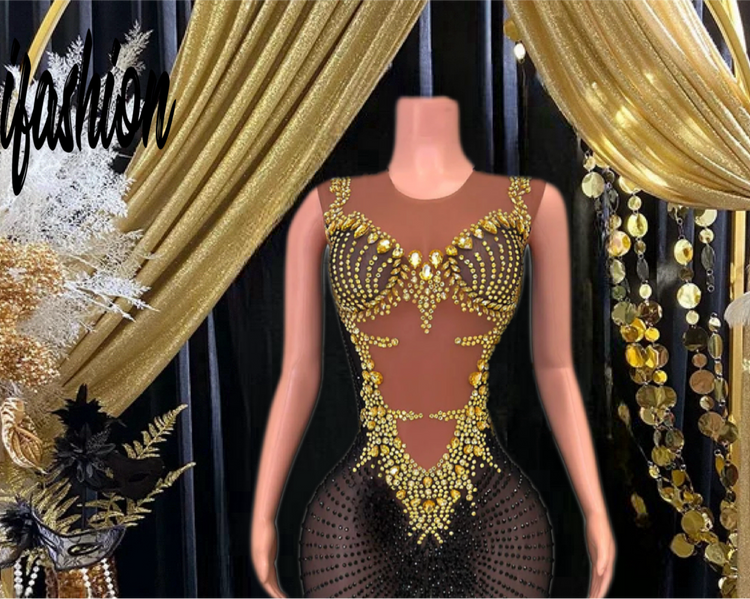 A glamorous Queen Maxi Dress featuring diamond-inspired accents and rhinestone embellishments, showcasing an elegant and flowing maxi silhouette