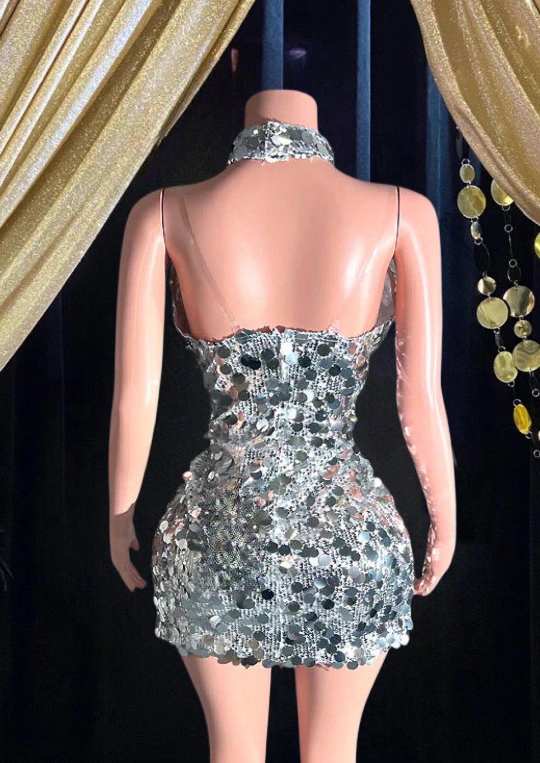 A sparkling Sequins Mini Dress with diamante embellishments, perfect for cocktail parties and special events.