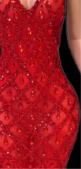 A sleeveless sequins maxi dress with rhinestones, showcasing an elegant floor-length design perfect for formal occasions.