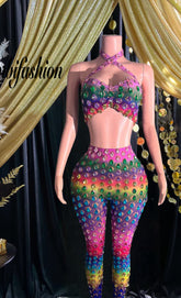 A vibrant rainbow set party dress with colorful patterns, perfect for festive occasions and celebrations.