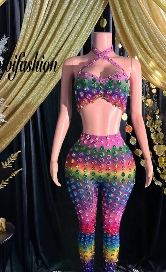 A vibrant rainbow set party dress with colorful patterns, perfect for festive occasions and celebrations.