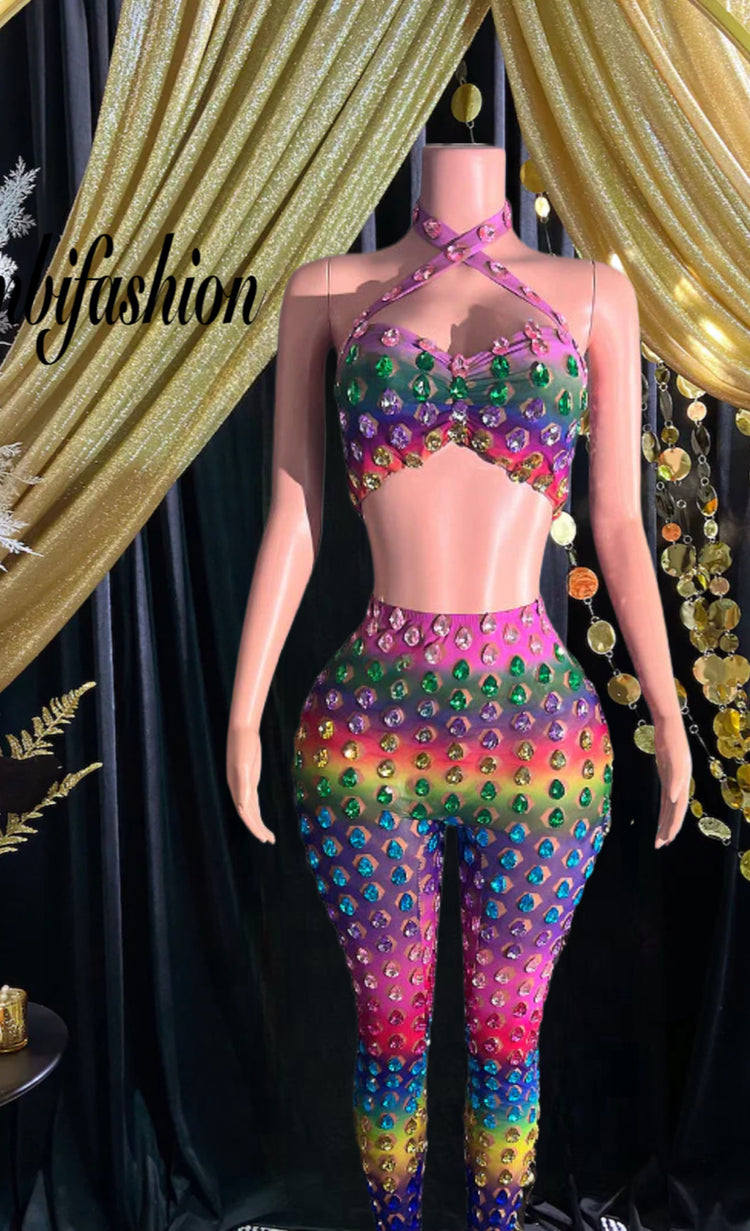 A vibrant rainbow set party dress with colorful patterns, perfect for festive occasions and celebrations.
