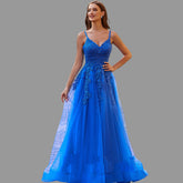 A-line tulle prom dress with intricate applique details, featuring a flowing tulle skirt and a fitted bodice, perfect for formal occasions and special events