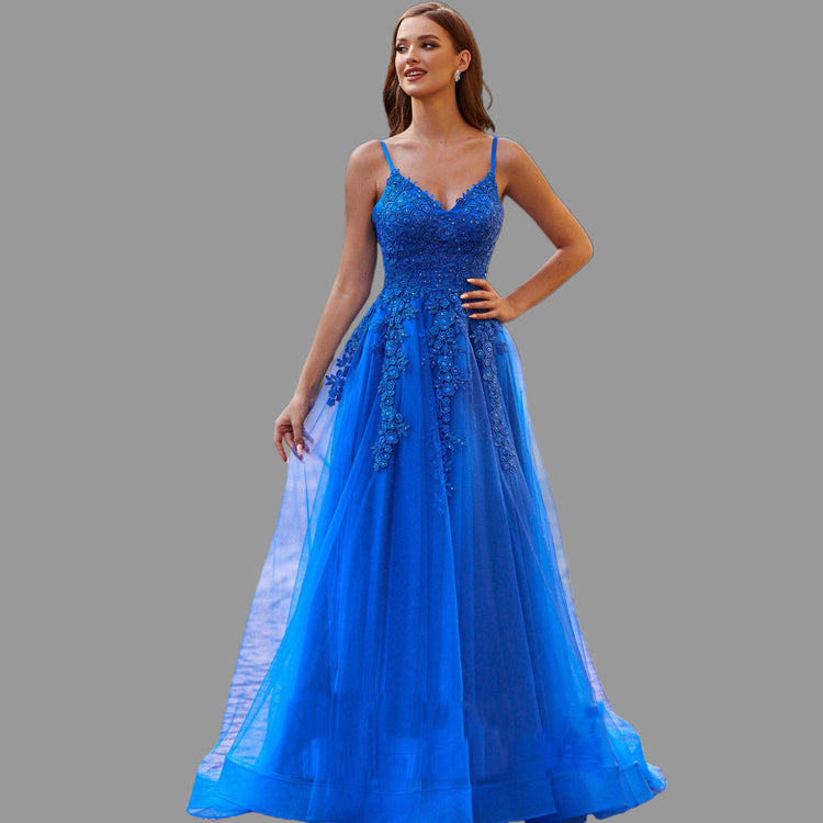 A-line tulle prom dress with intricate applique details, featuring a flowing tulle skirt and a fitted bodice, perfect for formal occasions and special events