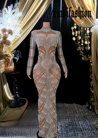 A glamorous diamante sexy dress featuring sparkling details and a stunning, figure-flattering design.