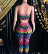 A vibrant rainbow set party dress with colorful patterns, perfect for festive occasions and celebrations.