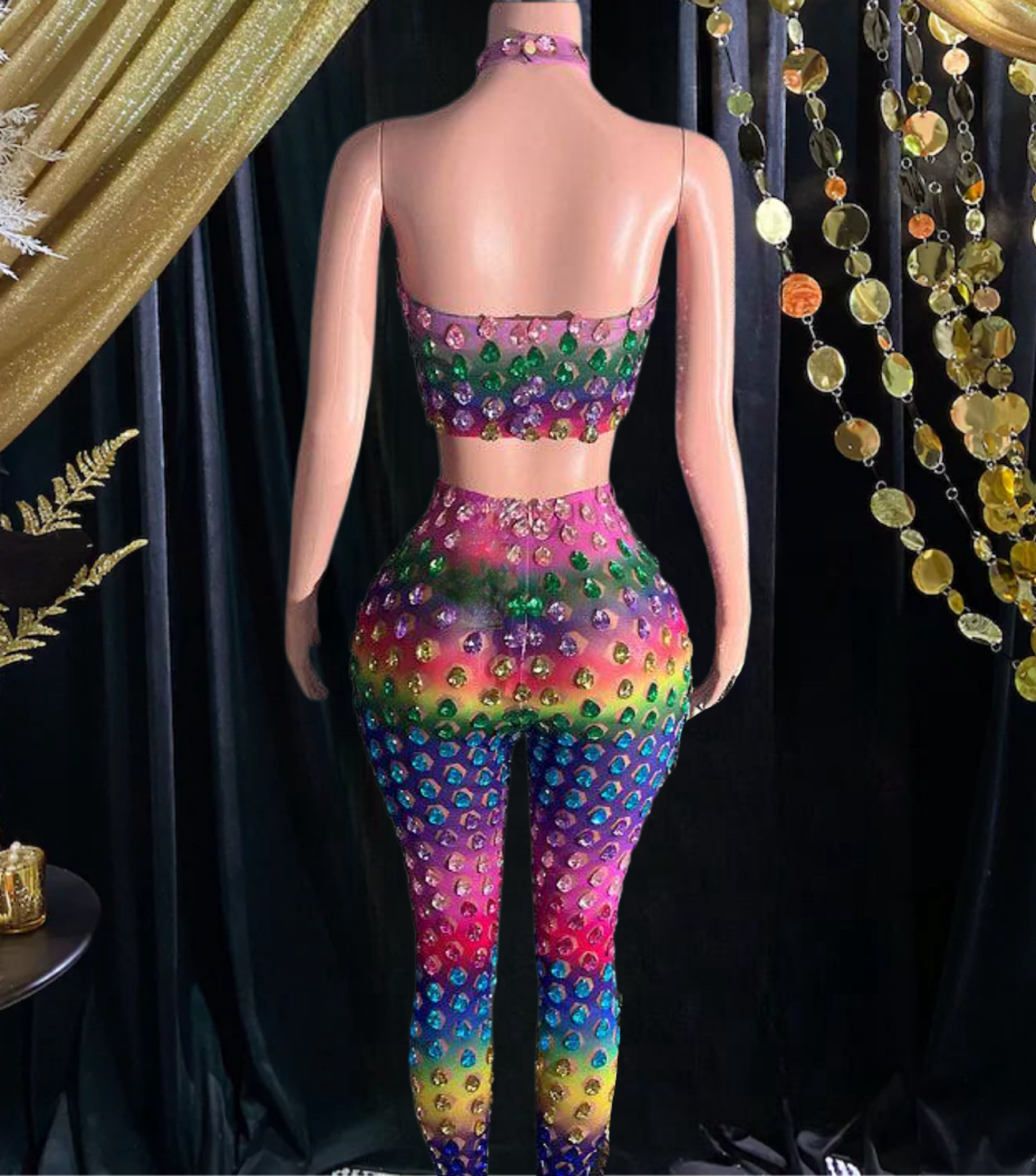 A vibrant rainbow set party dress with colorful patterns, perfect for festive occasions and celebrations.