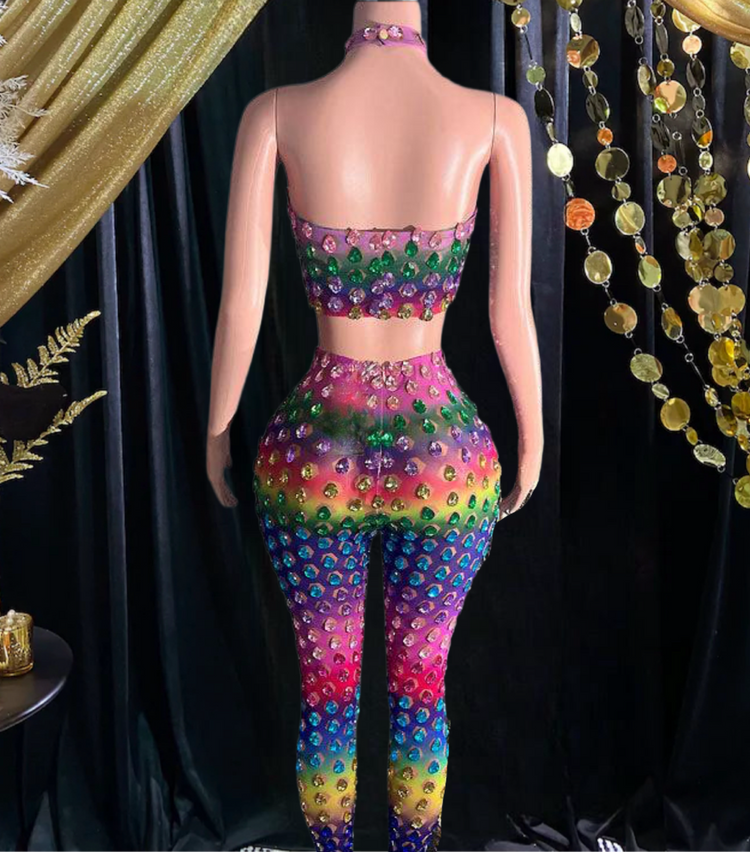 A vibrant rainbow set party dress with colorful patterns, perfect for festive occasions and celebrations.