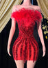 A red mini diamante dress with feather details, perfect for a glamorous evening or party