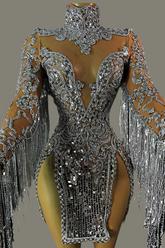 A glitter mini dress adorned with shimmering sequins, showcasing a sleek slip dress design with adjustable straps, perfect for parties and special occasions