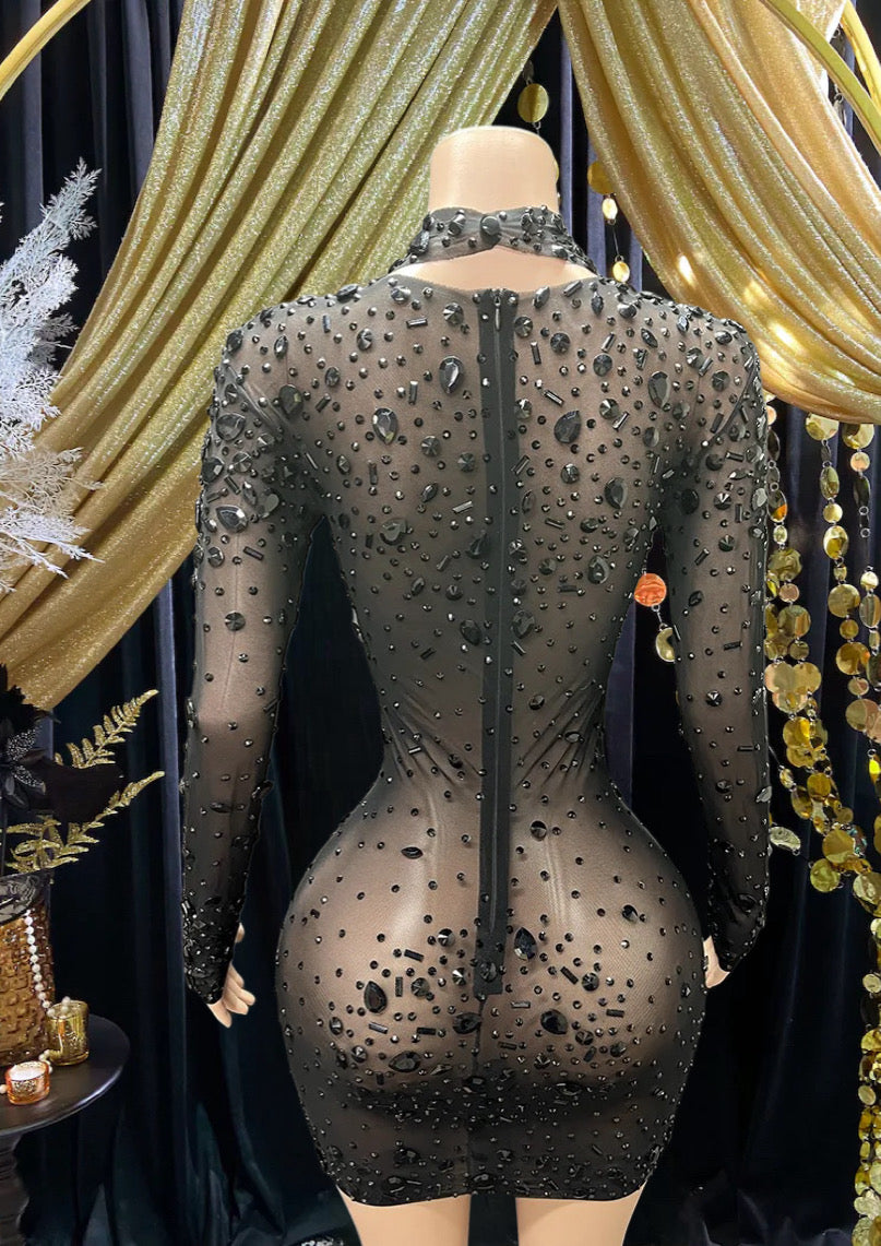 Black diamante mini dress with elegant detailing.