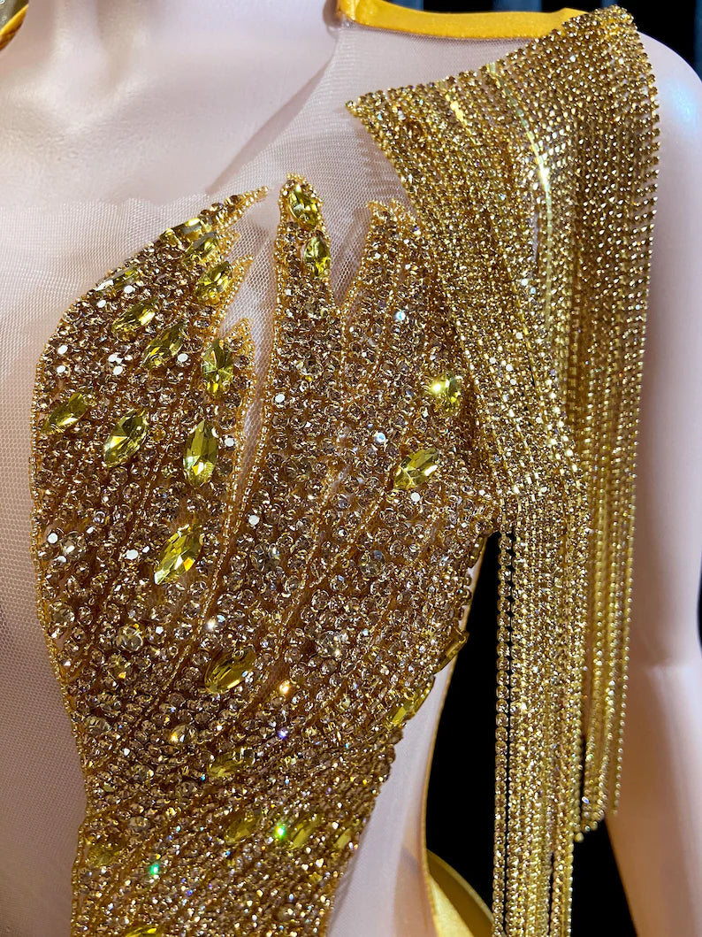 Eve Embellished Mini Dress in Gold with intricate rhinestone detailing, perfect for glamorous events and special occasions."