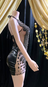 Appliqué mini dress with black rhinestones, featuring intricate detailing and perfect for parties or formal events