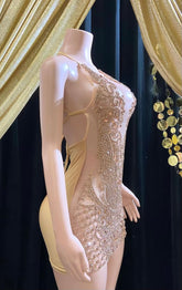 Front view of a gold rhinestone A-line mini dress with sparkling rhinestones and an elegant fit.