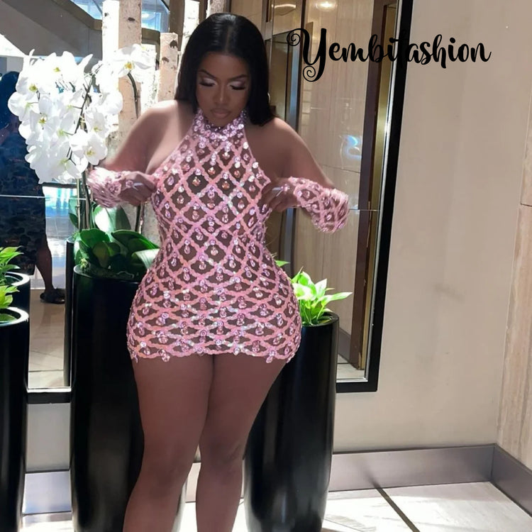 A Pink Mini Dress with rhinestone embellishments, perfect for special occasions.