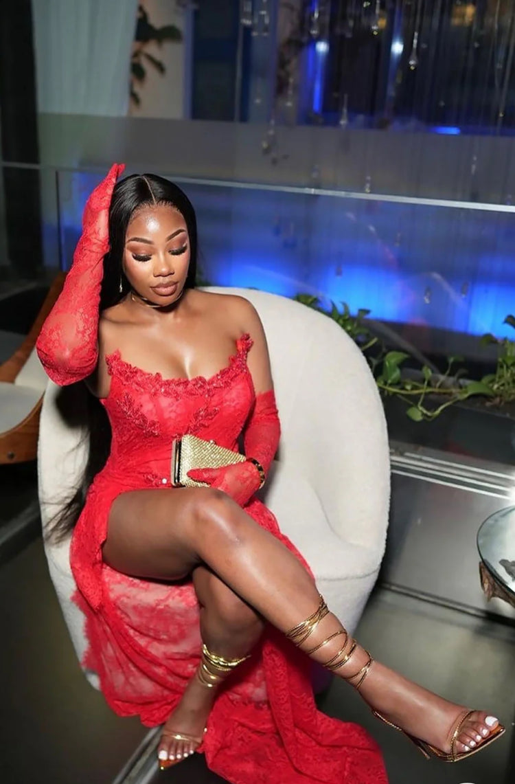 A glamorous red lace long dress with intricate details, designed as a versatile set dress for formal occasions.