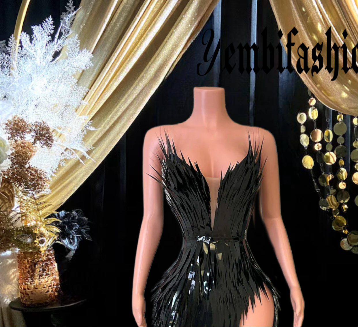 A chic black feather dress perfect for homecoming or as a stylish prom dress, featuring elegant feather details and a sleek silhouette