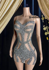 Model wearing a Silver Rhinestone Birthday Dress for special occasions, adorned with shimmering rhinestones