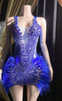 A royal blue tulle mini dress with rhinestone embellishments, perfect for evening events.