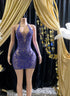 Glamorous rhinestone mini dress with a body-hugging fit, sparkling embellishments, and adjustable straps