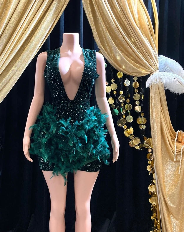 Dark green feather-embellished mini dress with rhinestone details, perfect for a birthday celebration or special event.