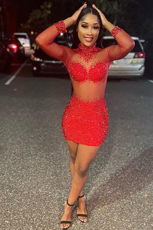 A sleek Red bodycom dress with mesh detailing, highlighting a form-fitting silhouette for an elegant and sophisticated look.