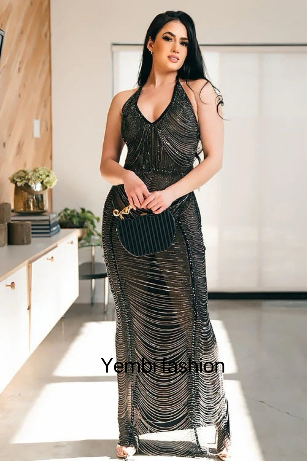 Black rhinestone chain dress with sparkling rhinestones and elegant chain detailing, perfect for prom or special events